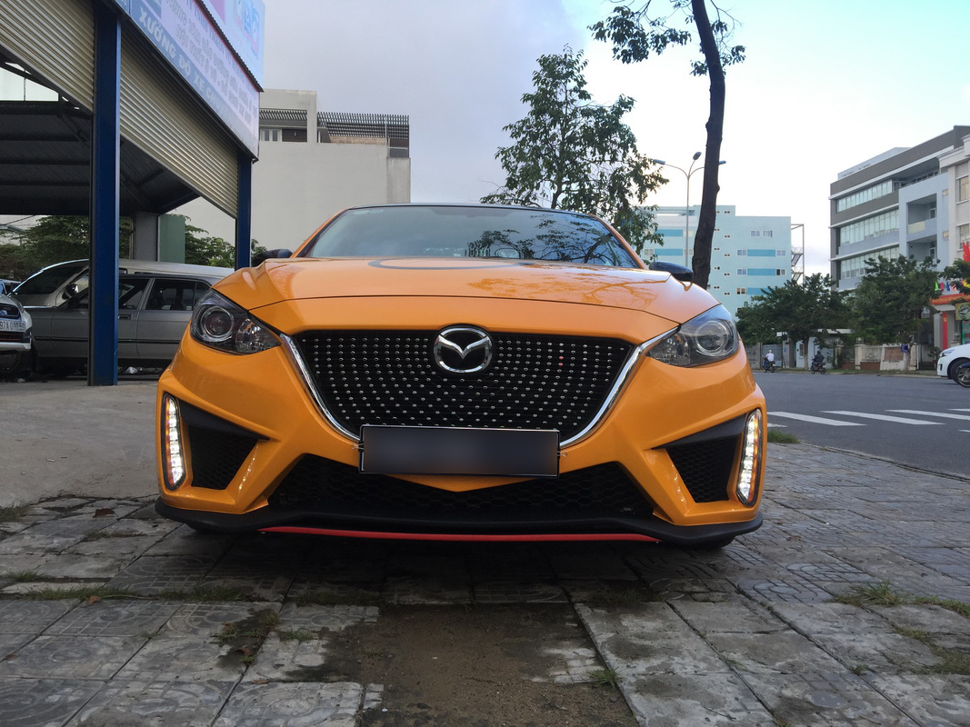 Cận cảnh bản Mazda3 độ tại Đà Nẵng với lớp áo ngoài màu cam rực rỡ