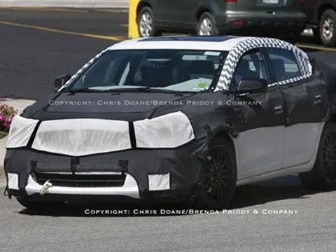 2009 BMW 7 Series và 2010 Buick LaCrosse lộ diện