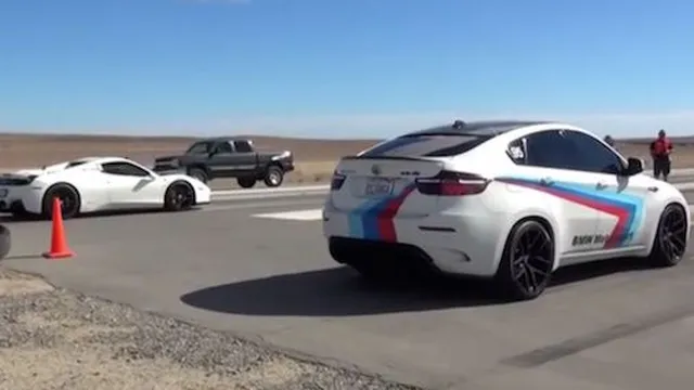 [Video] - BMW X6M đối đầu Ferrari 458 trên đường băng